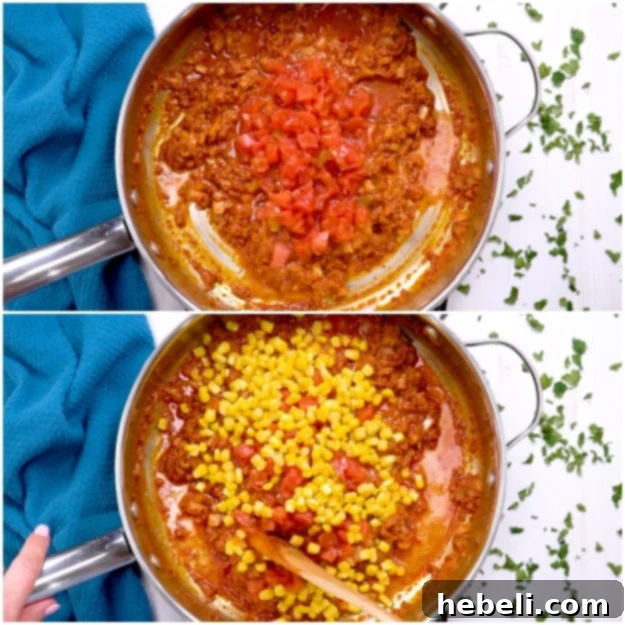Chorizo Rice Fiesta 6 Adding diced tomatoes and corn to the cooked chorizo mixture in a skillet, creating a colorful blend.