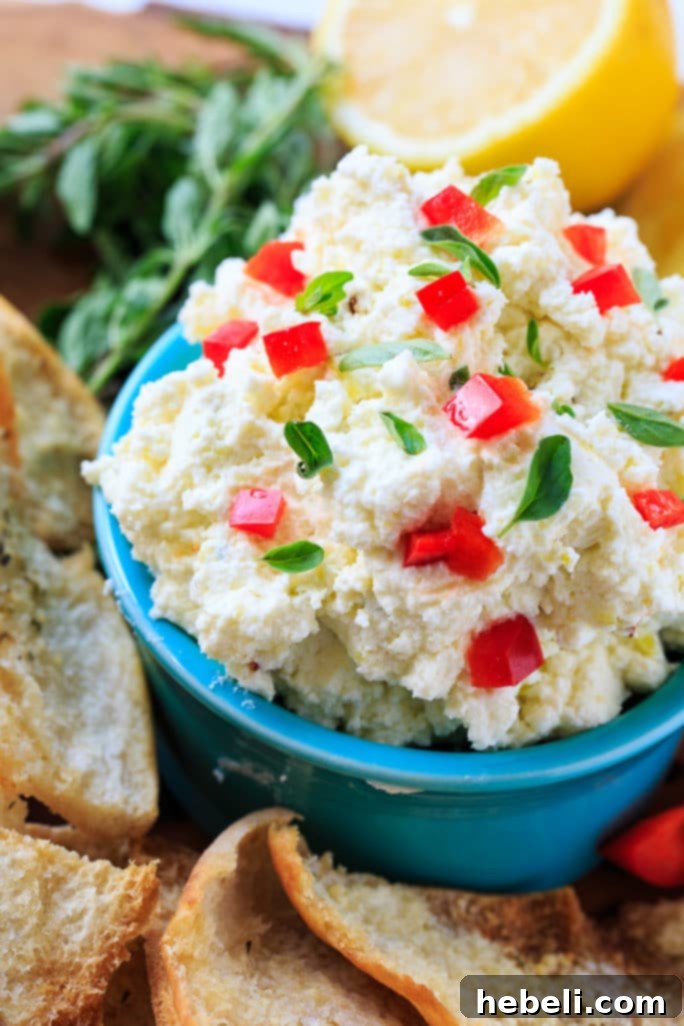 Creamy Feta Spread served with pita chips makes a delicious appetizer.