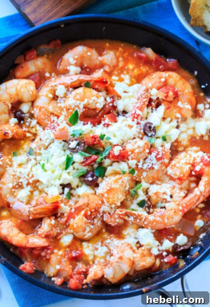 Mediterranean Feta Tomato Shrimp 3 A vibrant bowl of Greek Shrimp with Tomatoes and Feta, showcasing the rich red sauce and crumbled white feta.