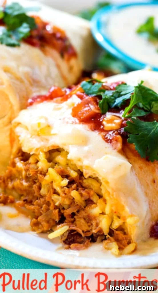 Cross-section of a Pulled Pork Burrito, revealing the juicy pork, rice, and melted cheese