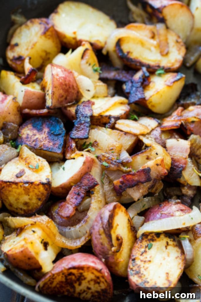 Bacon-Braised Red Potatoes in a Skillet