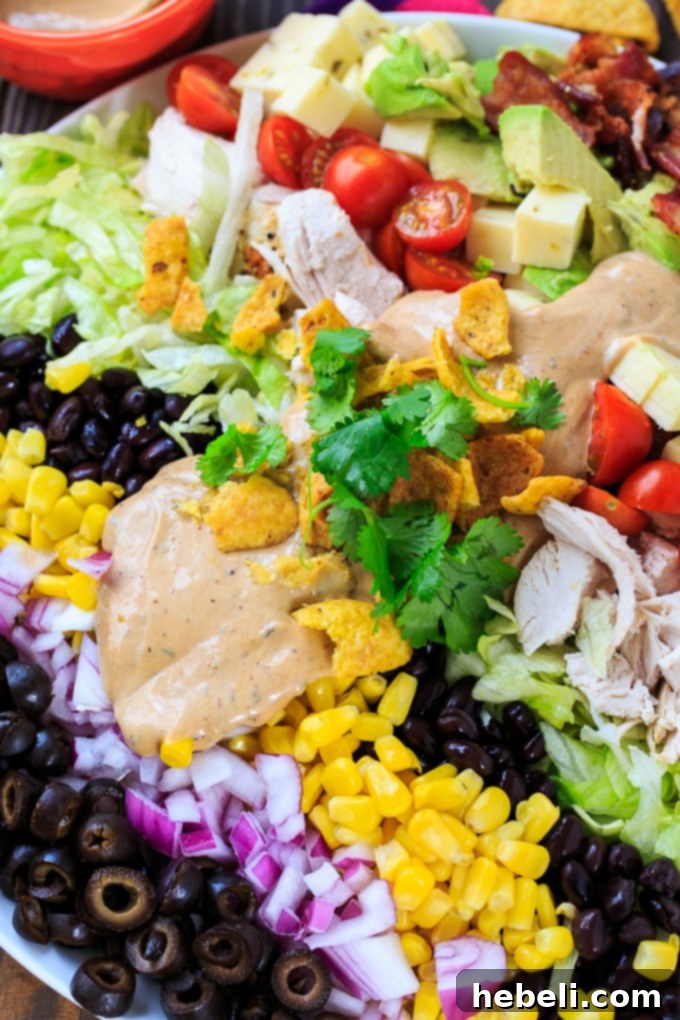 Tex-Mex Cobb Salad generously drizzled with BBQ Ranch Dressing