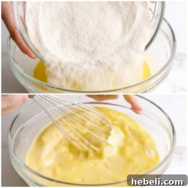 Adding dry ingredients to the wet mixture.