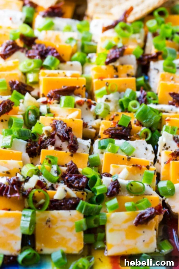 Spiced Cheese Infusion 4 Spicy Marinated Cheese is perfect for sharing with crackers.