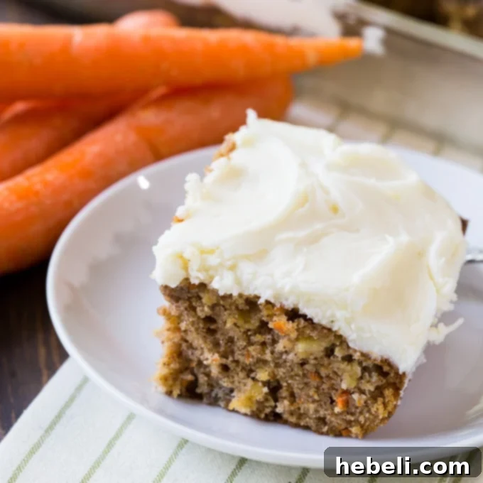 Deliciously moist Pineapple Carrot Cake with spices and cream cheese frosting