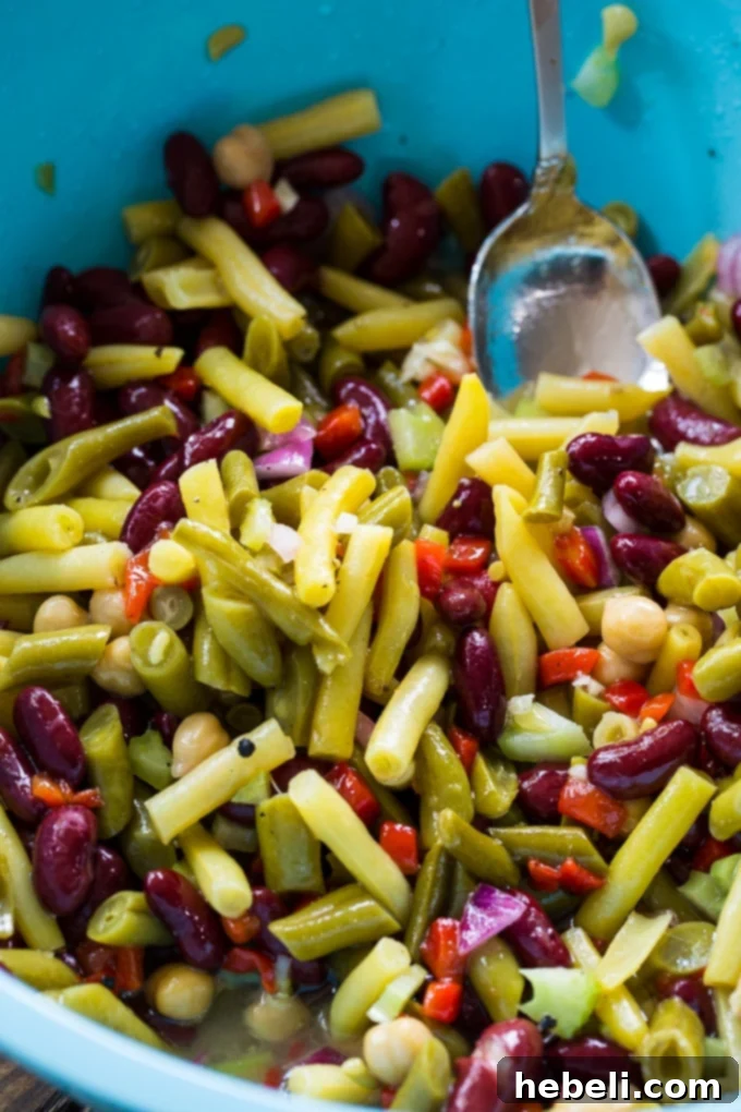 Zesty Bean Medley 3 Close-up of Sweet and Tangy Four Bean Salad, showcasing its vibrant colors and fresh ingredients