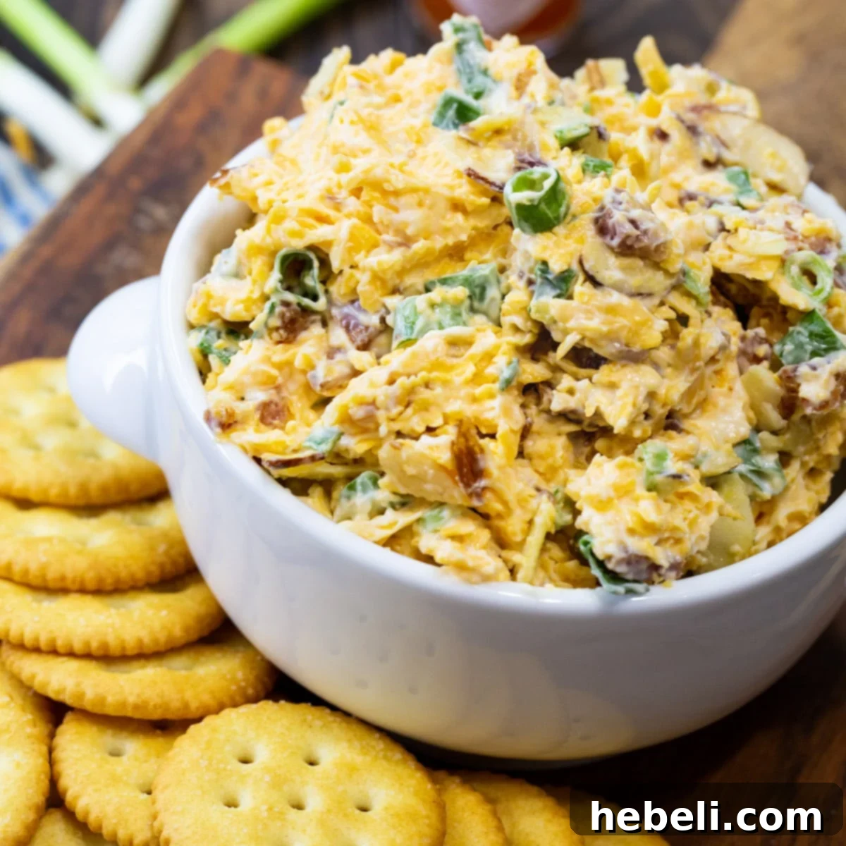 Neiman Marcus Dip in a bowl surrounded by crackers, ready to be served.