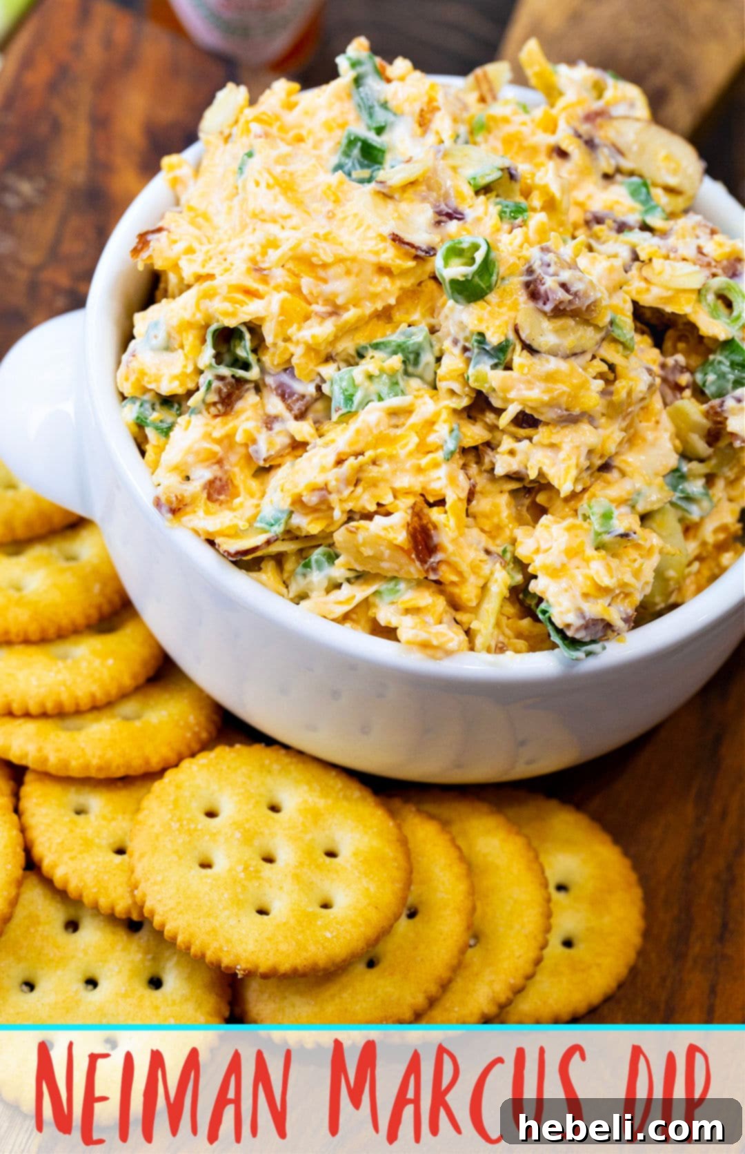 Close-up of Neiman Marcus Dip in a bowl surrounded by crackers, ready for serving.