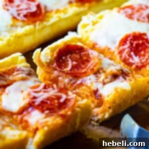 Garlic Bread Pizza cut into slices, ready to be served.
