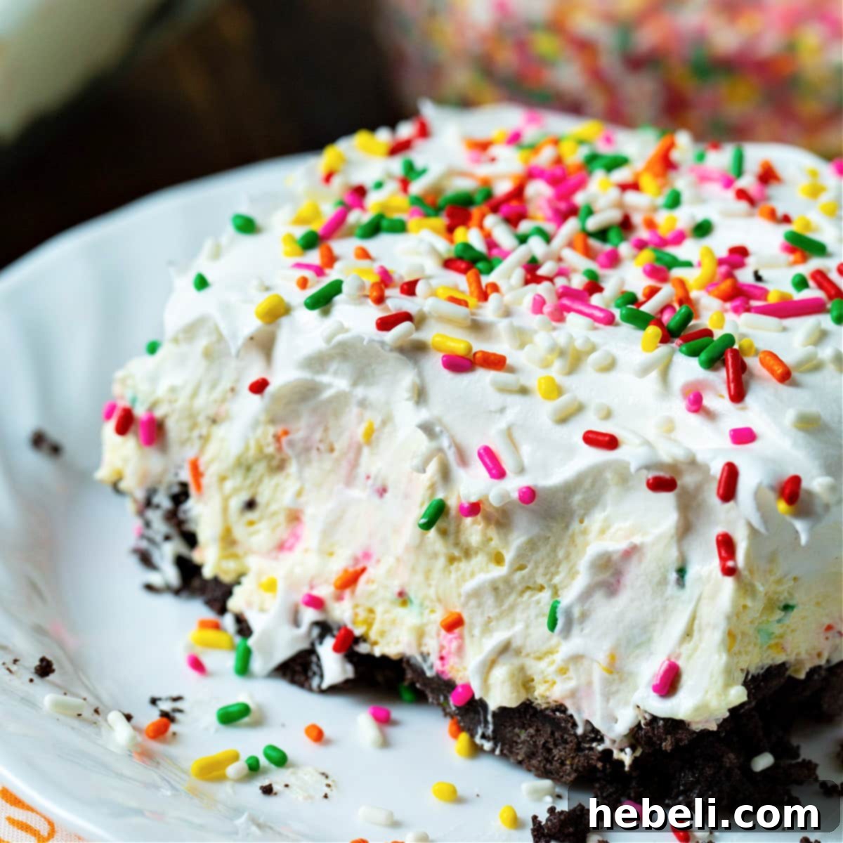 Birthday Wish Bath Bomb 2 Birthday Cake Lush topped with lots of sprinkles, a vibrant and appealing no-bake dessert.