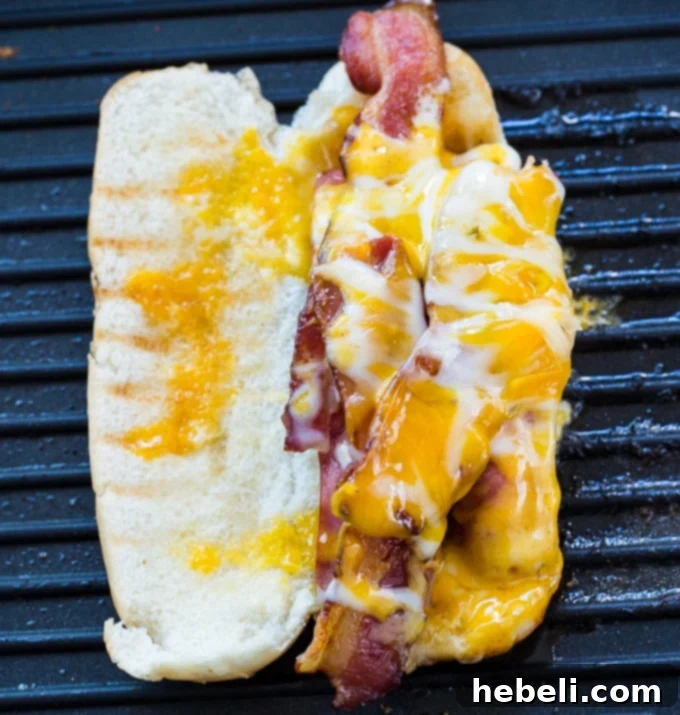 Cheesy Frank Melt 6 Multiple Grilled Cheese Hot Dogs ready to be served, showcasing the melted cheese and bacon.