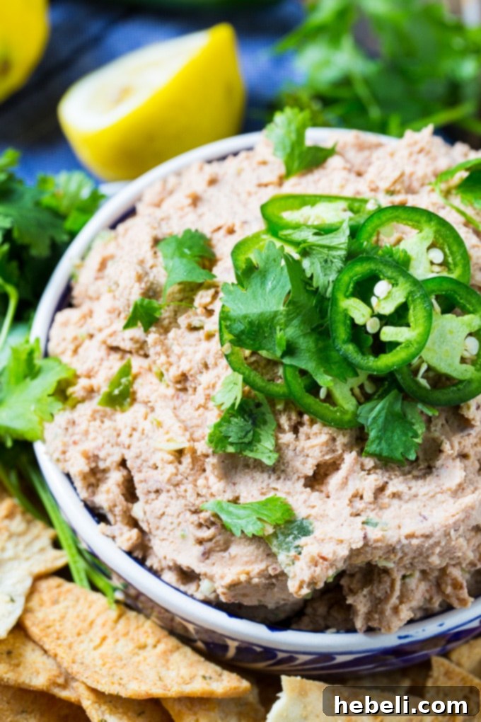 Fiery Smoked Black Eyed Pea Dip 5 Smoky Jalapeno Black-Eyed Pea Hummus garnished with cilantro and sliced jalapenos