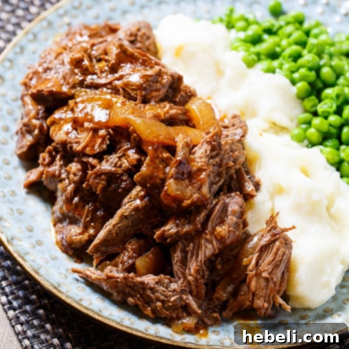 Perfectly Shredded Beef Short Ribs served with a rich tomato sauce