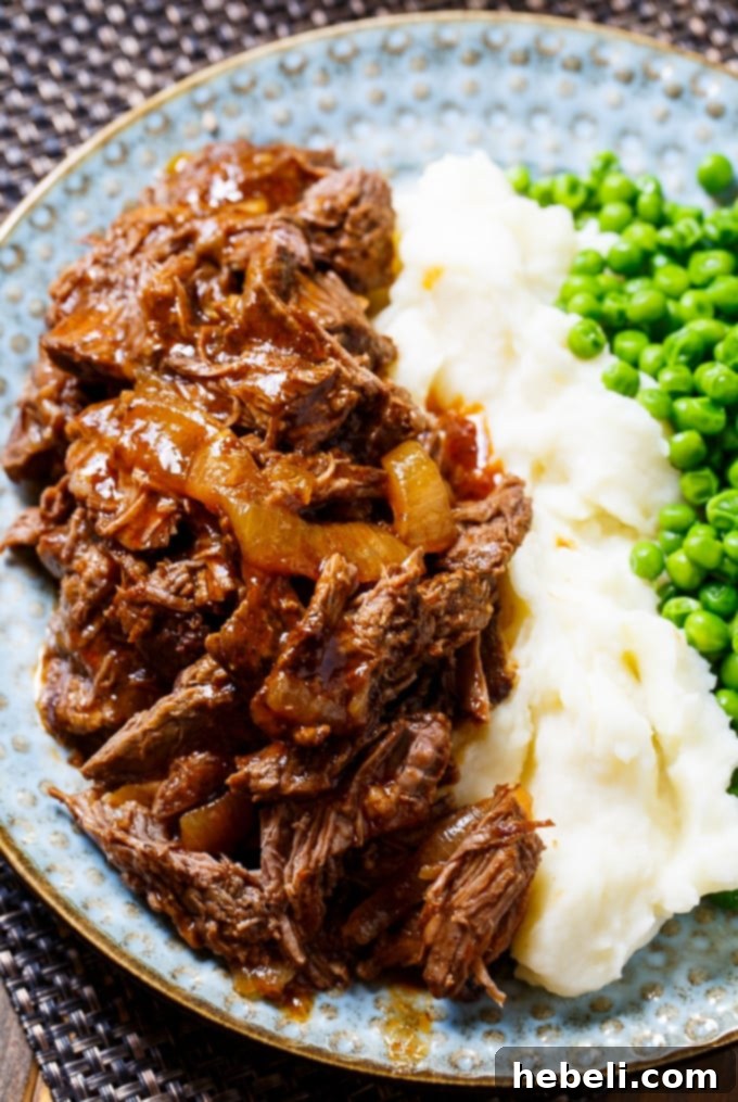 Uncooked boneless beef short ribs, seasoned and ready for searing
