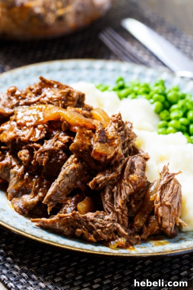 A Lodge Cast Iron Enamel Dutch Oven, ideal for slow cooking