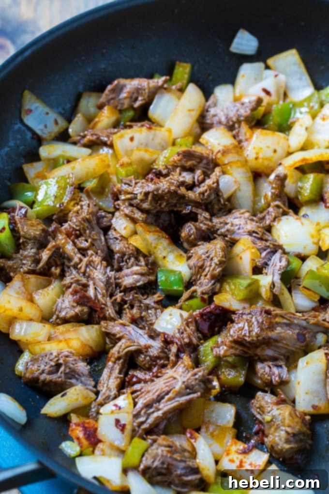 Zesty Beef Quesadillas 4 Close-up of a Spicy Beef Quesadilla, showcasing the melted cheese and delicious filling.