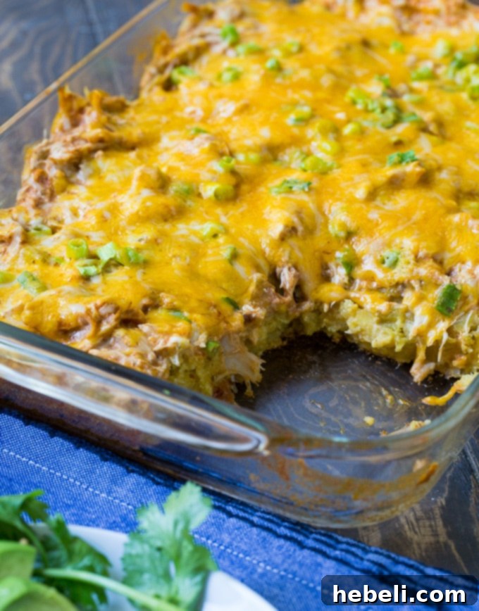 Spicy Chicken Tamale Casserole with a vibrant array of fresh toppings, showcasing its inviting Tex-Mex appeal.