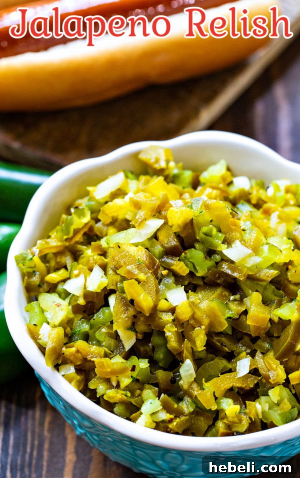 Close-up of freshly made Homemade Jalapeno Relish in a blue bowl, showcasing its vibrant texture and inviting appeal.