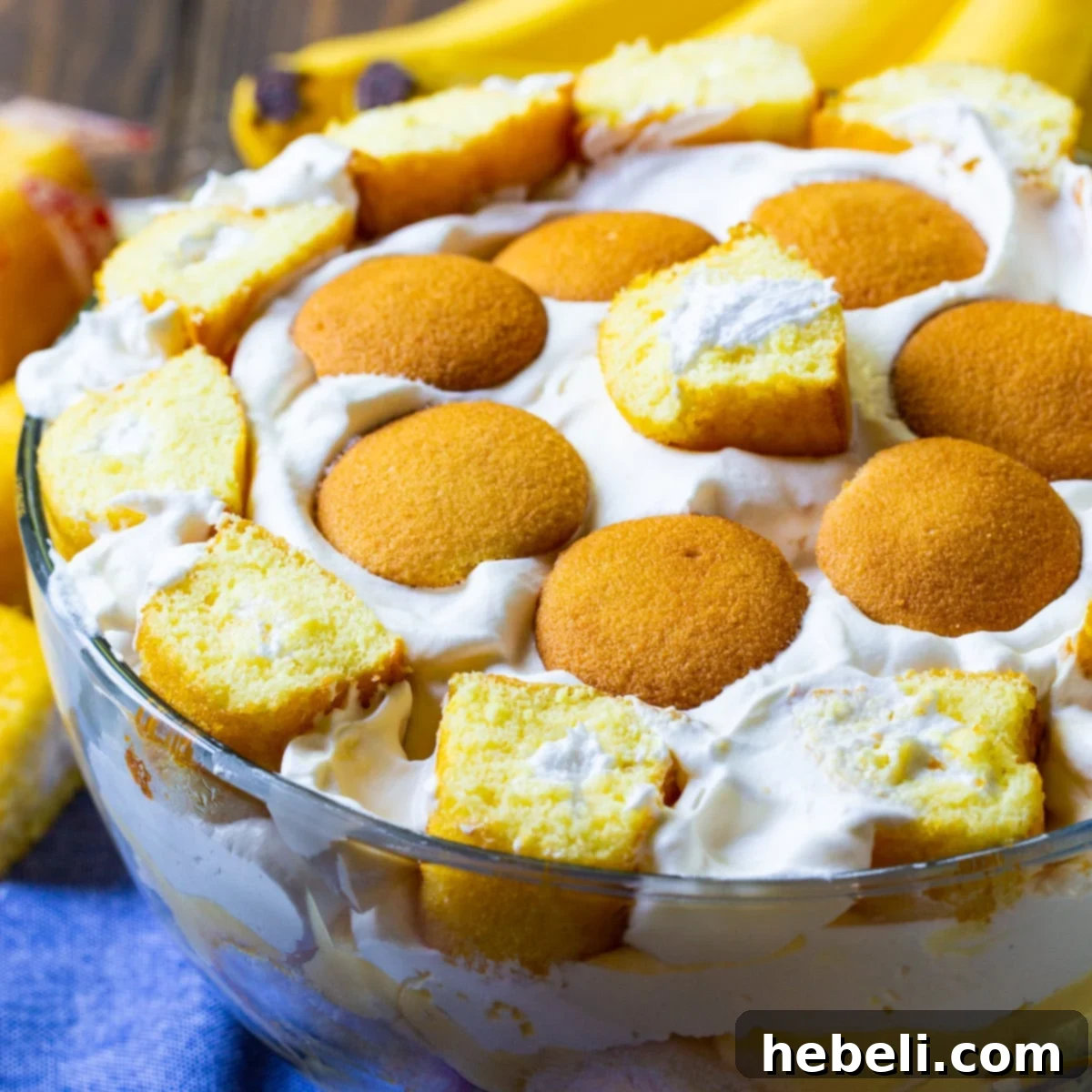 A stunning Twinkie Banana Pudding served in an elegant trifle bowl, showcasing its delicious layers.