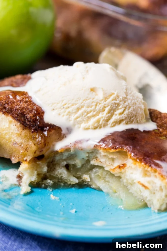 Effortless Apple Dumplings 5 Easy Apple Dumplings served with ice cream for a delicious fall dessert.