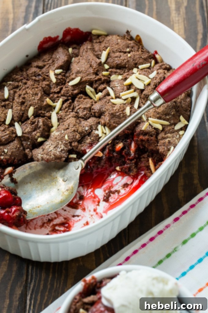 All the simple ingredients for Chocolate Cherry Cobbler laid out on a kitchen counter.