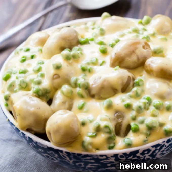Cheesy Creamed Peas and Potatoes