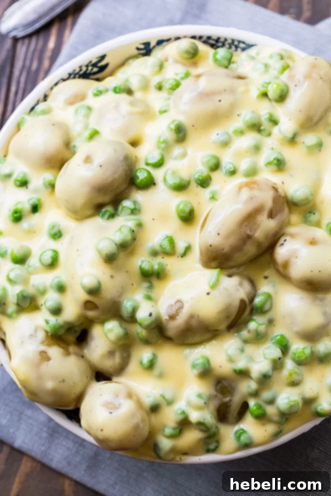 Cheesy Creamed Peas and Potatoes recipe