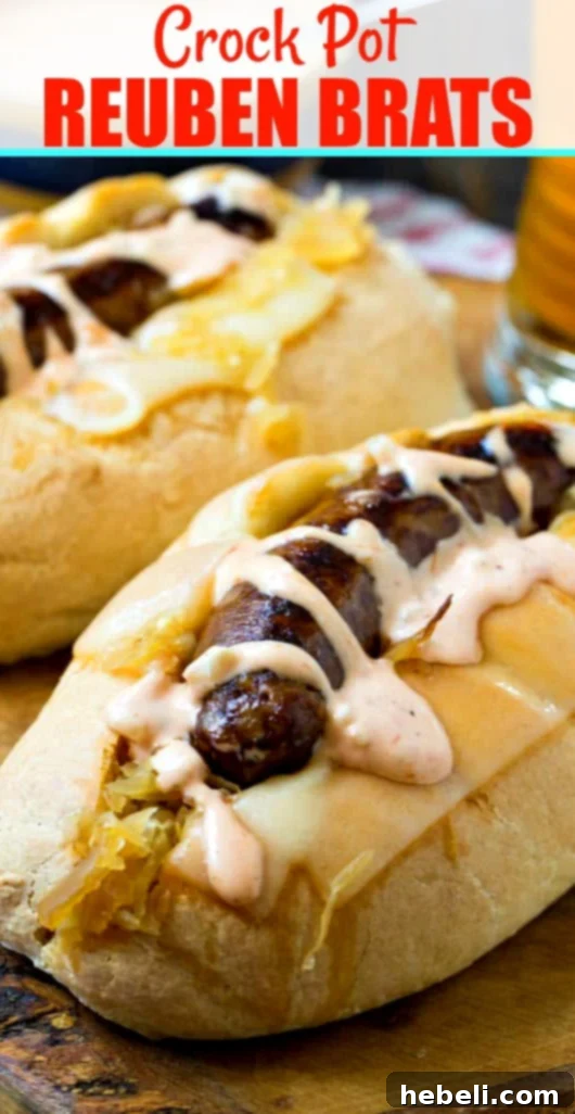 Easy Slow Cooker Reuben Brats 6 A beautifully plated Crock Pot Reuben Brat, with its bun slightly toasted, cheese melted, and dressing generously applied.