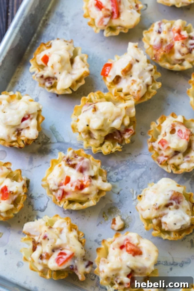 Mini Hot Brown Tarts arranged beautifully for a Kentucky Derby Party spread.