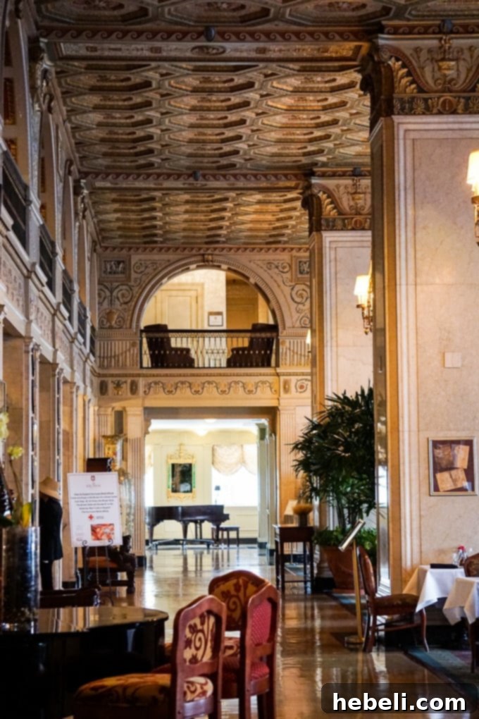 Another view of The Brown Hotel lobby, showcasing its opulent design.