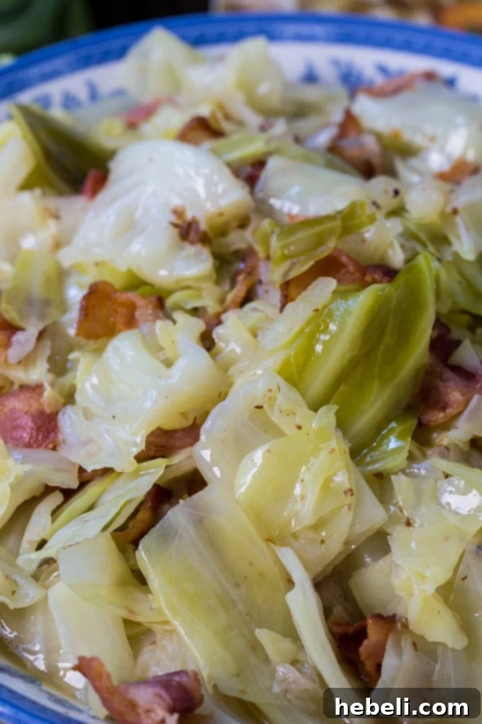 Southern Cabbage simmering gently in a pot, made with College Inn chicken broth
