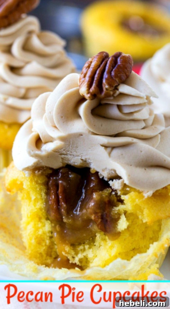A beautifully decorated pecan pie cupcake on a white background, ready to be enjoyed.