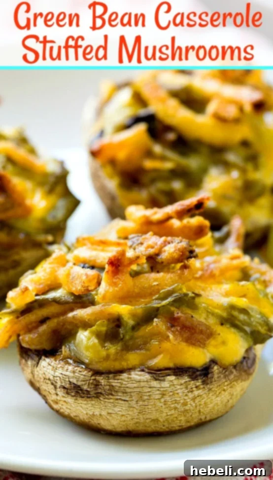Green Bean Casserole Mushroom Bites 7 An inviting platter of Green Bean Casserole Stuffed Mushrooms, garnished with fresh herbs and presented elegantly for a holiday spread