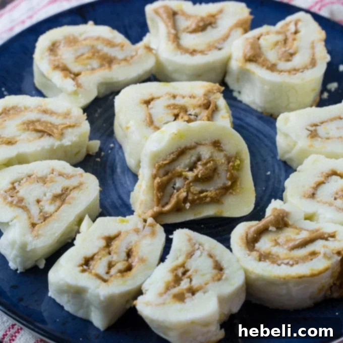 Old-Fashioned Potato Candy rolls sliced with peanut butter swirl