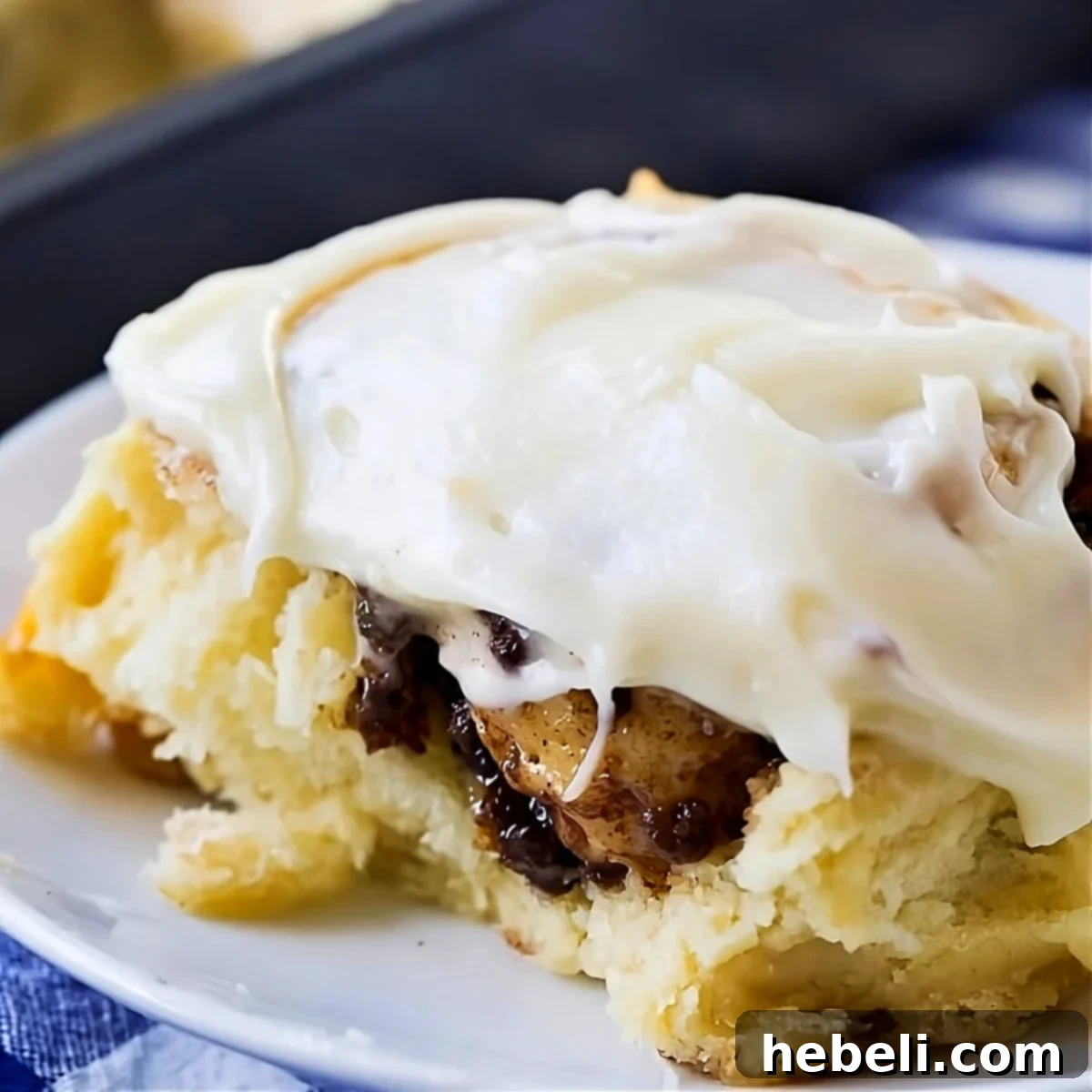 Sweet & Savory Sausage Cinnamon Rolls 2 A delicious Sausage Cinnamon Roll served on a plate, ready to be enjoyed.