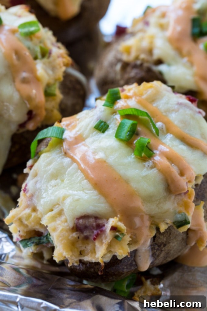 Delicious Double Stuffed Reuben Potatoes generously filled with ingredients, close-up