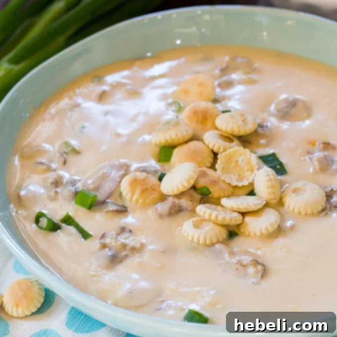 Homemade Creamy Oyster Stew with fresh parsley garnish