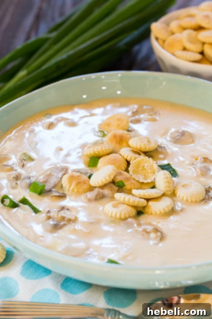 Homemade Oyster Stew in a bowl with a spoon