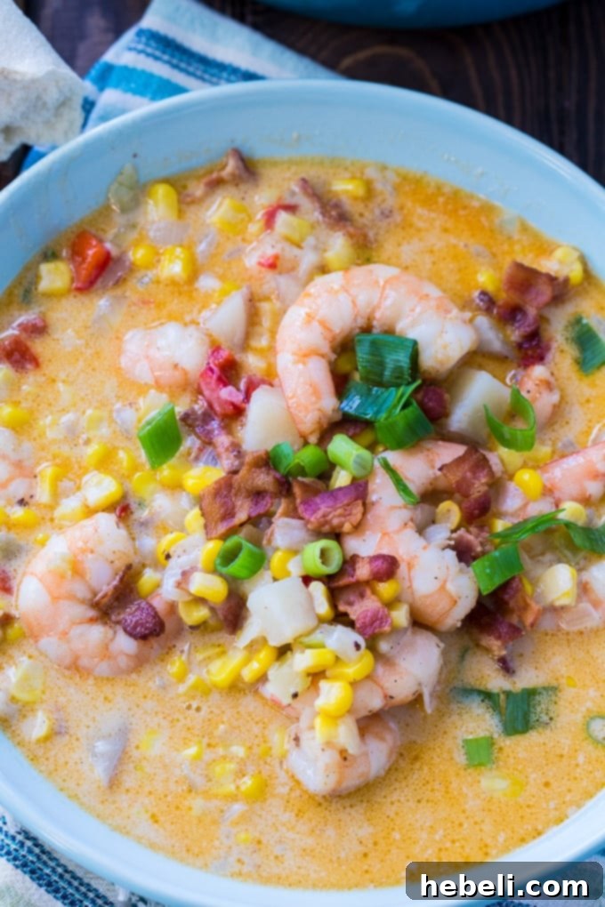 Hearty Cajun Shrimp and Corn Chowder with bacon and potatoes