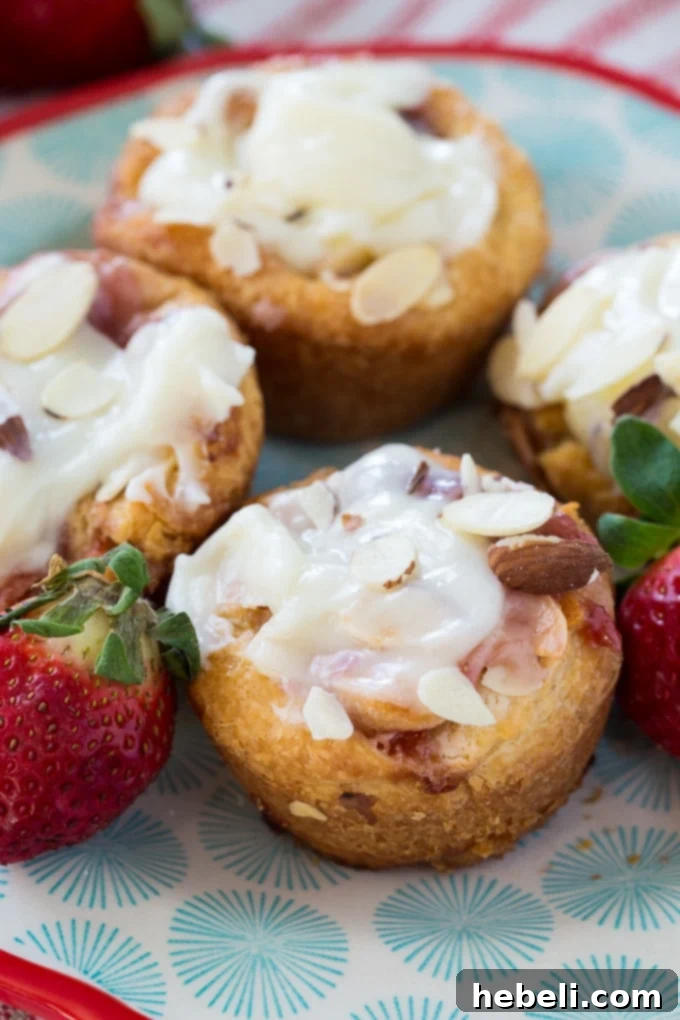 Strawberry Cream Cheese Danishes in a muffin tin after baking