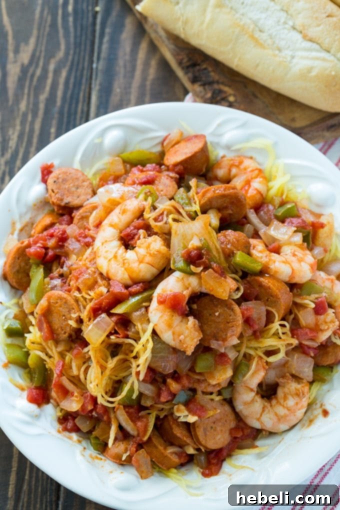 Cutting spaghetti squash across its width for longer strands, a key step for low-carb recipes