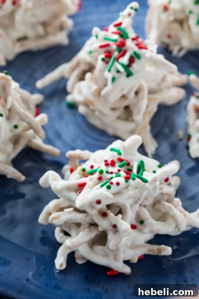 Close-up of White Chocolate Haystacks decorated with festive sprinkles