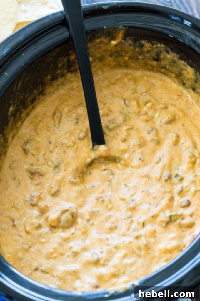 Ultimate Crock Pot Beef Queso Dip 2 Crock Pot Beef Queso Dip, rich and ready for serving