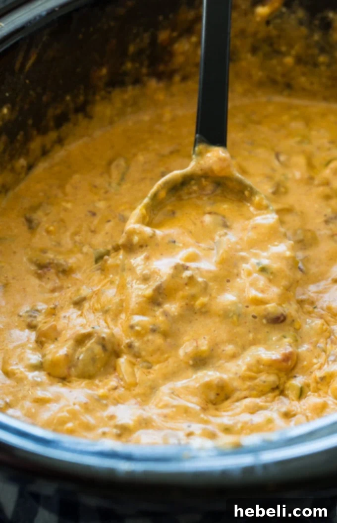 Ultimate Crock Pot Beef Queso Dip 3 Crock Pot Beef Queso is perfect for game day with chips