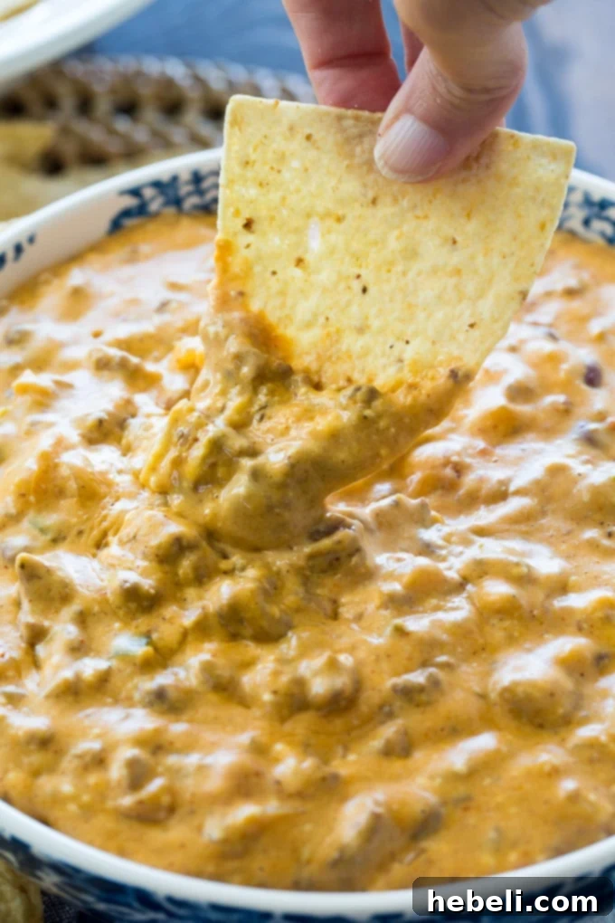 Ultimate Crock Pot Beef Queso Dip 8 Crock Pot Beef Queso ready for serving in a bowl