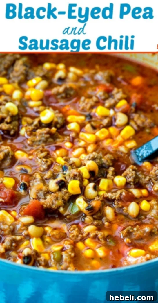 Overhead shot of Black-Eyed Pea and Sausage Chili in a bowl, with the text #southern #chili #blackeyedpeas #newyears.