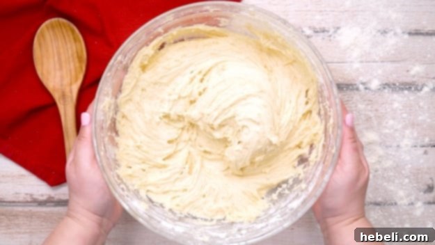 Cake batter in mixing bowl.