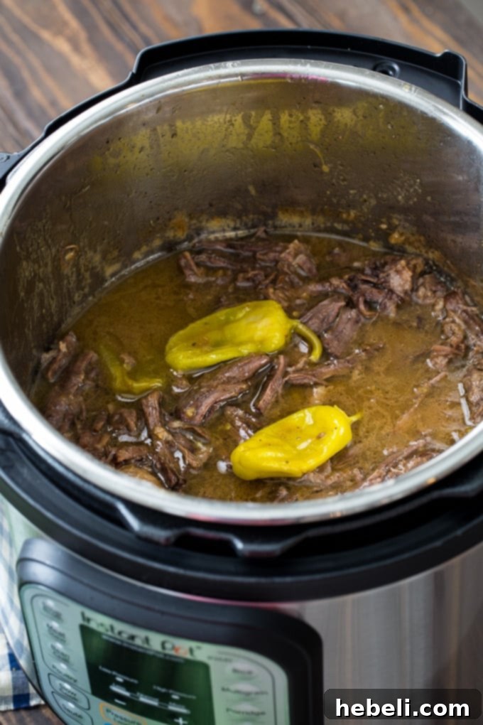 Mississippi Pot Roast: Instant Pot Edition 5 Shredded Instant Pot Mississippi Roast with rich gravy