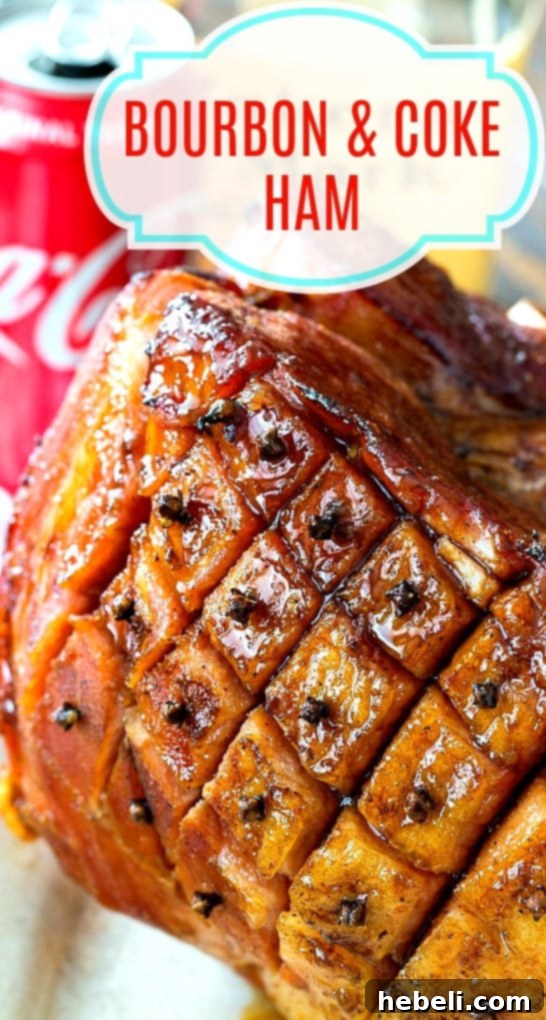 Beautifully glazed Bourbon and Coke Ham on a platter, garnished and ready to be carved and served