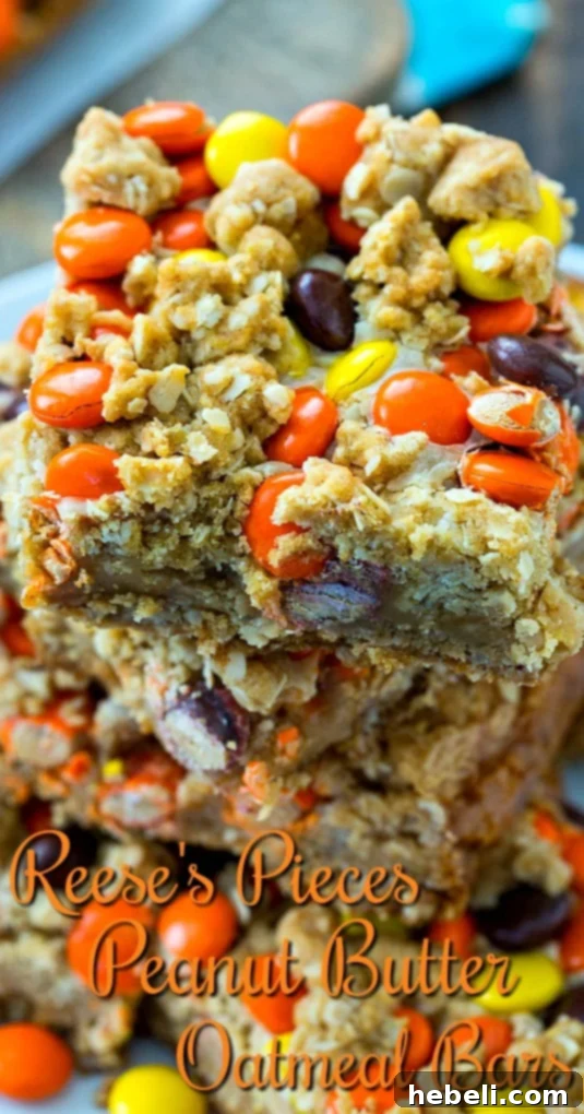 A stack of golden, inviting Reese's Pieces Bars, perfect for dessert.